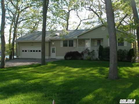 Beautiful 2 Bedroom Ranch Situated On Shy Acre With Dock On 100Ft Of Creekfront With Easy Access To Peconic Bay. Home Features 2 Bedrooms, 2 Full Baths,(1 Bath Is Marble), Two Fireplaces, Granite Kitchen Floor And Counters, And Huge Deck Overlooking Eugene's Creek. Come Bring Your Boat And Enjoy This Waterfront Home In The Heart Of Wine Country. Less Than 95 Miles To Nyc!