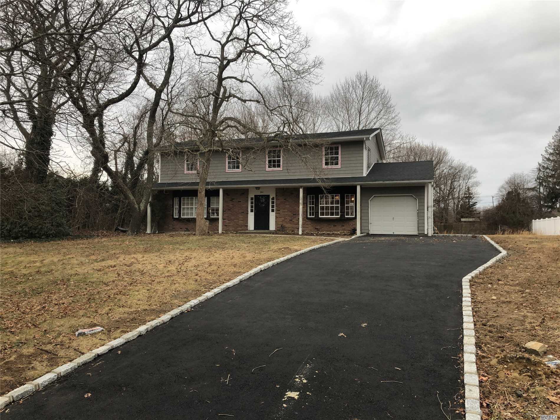 Gorgeous Newly Renovated Colonial on A Private Cul De Sac. Features Top Of The Line Renovations Inside & Out. Fully Renovated Kitchen and Bathrooms. All New Stainless Steel Appliances. Hardwood Floors Throughout. Very Open Living Space. Deep 5 Car Newly Paved Driveway Leads to Garage. Close Distance To All This Town Has To Offer. Great Over Sized Park-Like Backyard Great For Entertaining. Gorgeous Home That Has it All!