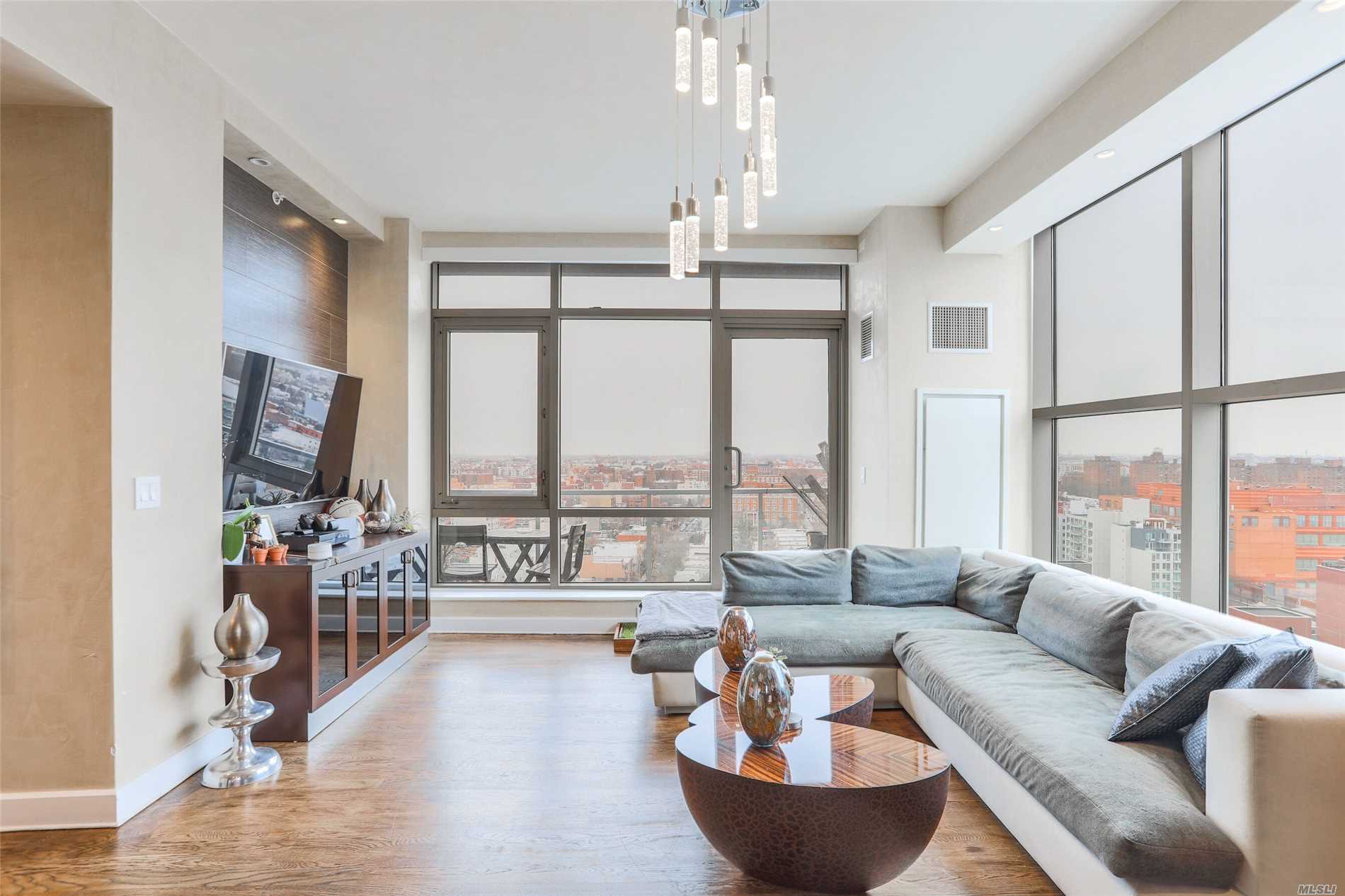 Gorgeous Two Bedroom Unit W/ A Balcony & 3 Parking Spots. Amenities Include Full-Time Doorman, Fitness Center, Landscaped Courtyard W/ Grilling Area, Bike Rack & Garage Parking. Steps From The New Ferry W/ Stops To Manhattan & Brooklyn. Walking Distance To Socrates Sculpture Park, Astoria Park, Noguchi Museum, & Costco. Unit Features A Gorgeous Kitchen W/ Stainless Steel Appliances, Hardwood Floors, Washer/Dryer In The Unit, Central Air & Heating, And A Balcony. Tax Abatement Until 2025