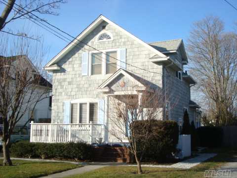 Lovely 2 Br, 1.5 Bath Colonial Located In S. Patchogue. Bright & Airy Lr, Dr, Country Kitchen, Cozy Family Rm W/ Woodburning Stove, Master Br W/ Skylight & Walkin Closet.  Home Boasts Many Updates: New Kitchen, Roof, Baths, Heat, Windows, Doors & More. Detached Insulated Garage.  Trex Deck & Large Private Rear Yard.  Walk To Water. 