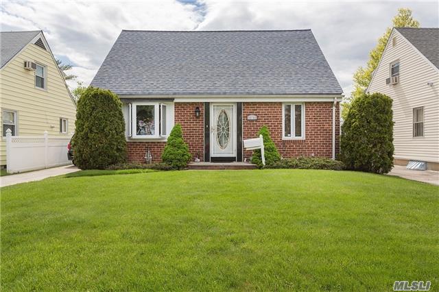 This Detached Brick Fireman's Cape Has Been Lovingly Updated W/ Modern Large Kitchen W/ Adjoining Dr, 3 Modern Full Baths, 45X101 Lot; Large Den Extension W/ Vaulted Ceiling, Skylight, Sliders To Deck & Yard. 3 Size-Able Bedrooms, Great Yard, 2 Car Garage, Prime Block, Great Transportation. Ps 159 & Is 25