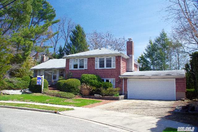 Unique Home In Perfect Cul De Sac Location,  Expanded Family Room,  Sun Room,  Specimen Plantings,  Two Fireplaces,  Great Stone Work And Large Rooms,  2 Car Garage And Full Basement