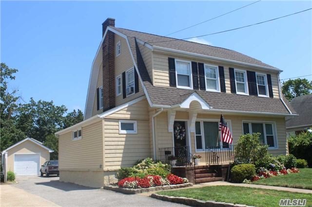 3 B Bedroom 1Full Bath 2 Half Bath Charming Colonial Home Turn Key Home With Low Taxes ! Beautiful Yard With A New Garage ! Enclosed Porch Can Be Used As A 4th Bdrm Or Office/Den Walking Distance To The Lirr And Shopping