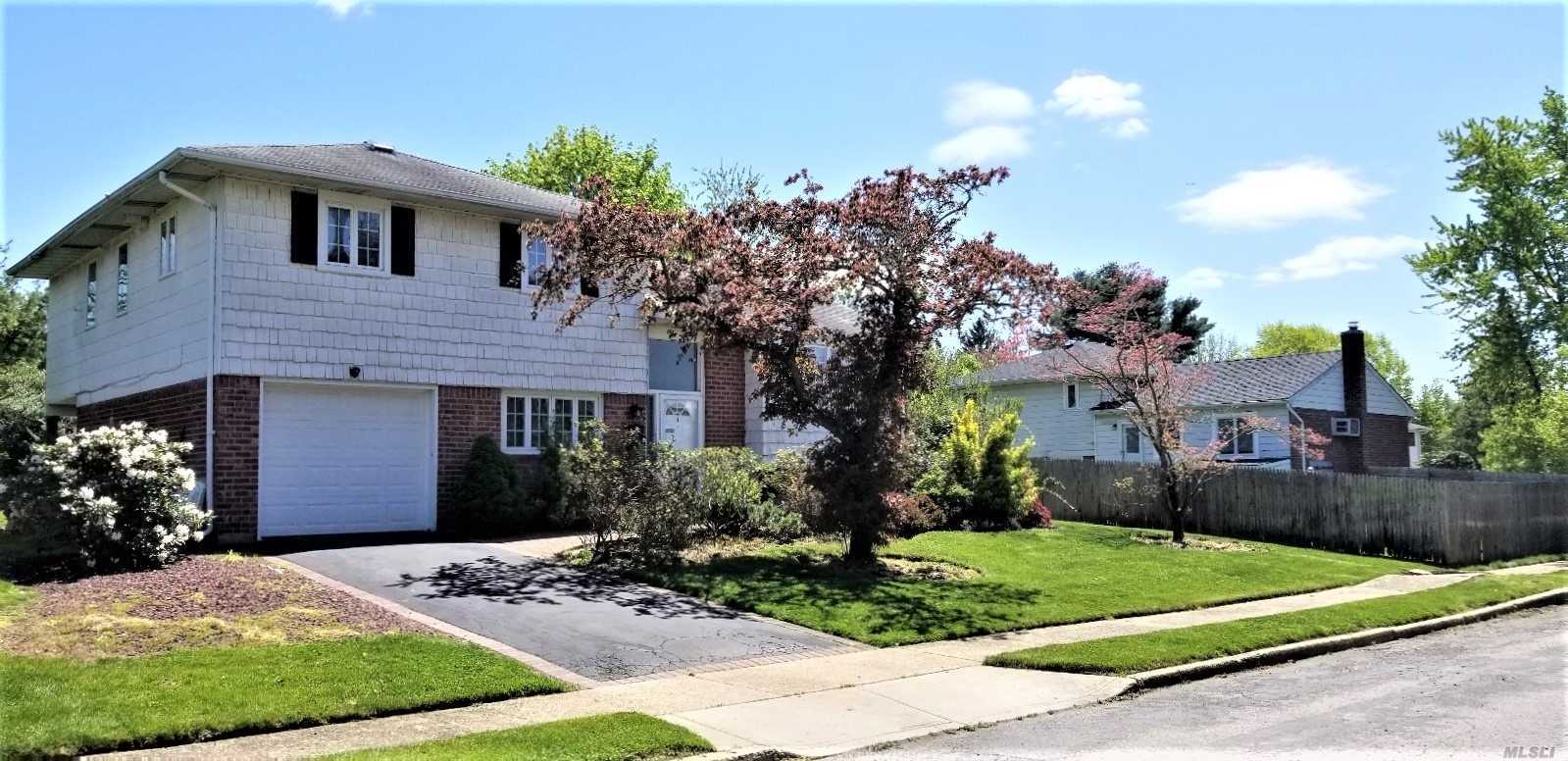 Opportunity is Knocking! Located in the heart of Old Bethpage and part of the highly recognized Plainview-Old Bethpage School district. A extension to the rear not only makes this home larger than the other standard splits in the area but allows it the opportunity to have a true Master Suite. Large wood deck, overlooking the spacious backyard.