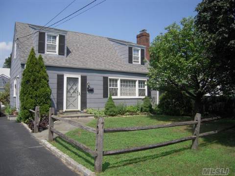 Doll House To Die For! This 3 Bdrm 1.5 Bath Cape Cod Is Ready To Move In! Great Starter Or Empty Nesters!  Formal Lr W/Wood Burning Fplc, Formal Dr Off Of Updated Kitchen, Powder Rm, Den/Bd All On 1st Floor. 2nd Floor Offers 2 Addt'l Bedrooms & Full Bath. Part Fin Bsmt With High Ceilings, New Gas Burner (2009) Oversized Detached 1 Car Garage. Private Backyard W/Patio.