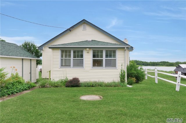 Great Waterfront Offering With Sailing, Kayaking And Paddle Boarding At Your Doorstep. At The End Of A Cul-De-Sac This Recently Updated Year-Round Cottage Has Everything You Need. A Painted Front Porch Welcomes You Into A The Main Living Room Dining Room Kitchen Area Onto The Back Porch-All With Stunning Views. Large Wood Deck To The Lovely Waterfront. Priced To Sell!