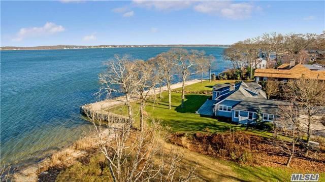 Inviting 3 Bedroom Ranch In The Coveted Harbor Lights Community Directly Across From Private Association Beach. Welcoming Floor Plan, Living Room With Fireplace, Kitchen And Dining Room. Sliding Doors Open To Large Deck For Summer Entertaining.