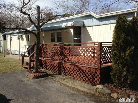 Your Own Little Piece Of The East End - A Great Getaway Spot Or Year Round In A 45 Unit Family Mobile Home Park Situated Right On The Peconic River! Nestled Between Protected Lands And Endless Roads For Biking, Hiking, Kayaking, And Cross Country Skiing.  Clean, Quiet, Low Park Fee.  Close Proximity To Shopping Outlets, Water Park, Beaches, And The Great Outdoors!
