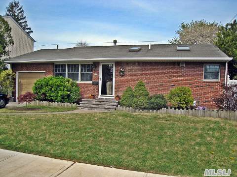 Charming Re-Done Custom Designed Brick Ranch. Nothing Neglected From Tip To Toe! Updated Kit.W/Honed Granite Counters Newer Baths,  Sunny Open Plan W Skylites. Extension Includes Family & Master Bedrm. Pvt.Entry To Bsmt.(Great Situation For Extended Family) Sep Laundry Plus 4th Br/Ba/Sitting Rm,  Etc. Newer Gas Heat & Hot Water Heater.200 Amp Serv.