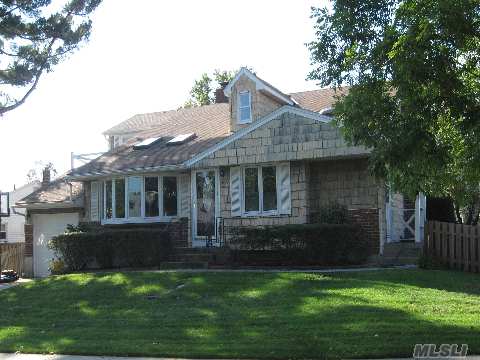 Come Inside To Appreciate This Colonial Style Home, Just Shy Of 2000 Sq' New Eik W Granite & Glass Tile Bcksplsh. Self Closing Wood Cabinets Ss Appliances New 1st Flr Bath W Italian Marble. 3 Generous Bdrms Upstairs. Spectacular New Bth W Both Jacuzzi Tub & Glass Enclosed Shower.Granite  Vanity W 2 Sinks. Fnshd Bsmnt Marble Bth Cac Gas Cook & Heat Taxes W Star 12,133 