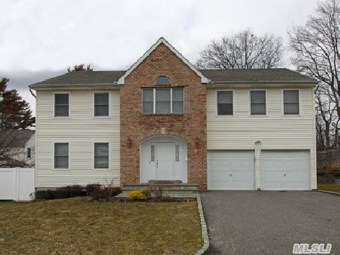 Welcome To This Newer Centerhall Colonial Set Back In A Private Cul De Sac In The Heart Of Plainview--Manetto Hill Address But On A Private Road. This Custom Home Features A Professional-Grade Gourmet Granite Eat-In-Kitchen, Cathedral Ceilings, Full Basement W/High Ceilings,Large Over-Sized Bedrooms & A Private Backyard