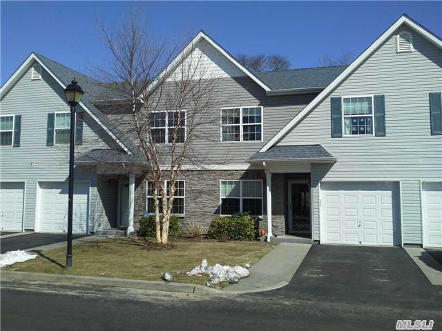 Spacious W/Open Floors Plan And Cathedral Ceiling W/ Skylights Over Living Area! Beautiful Kitchen W/Cherry Wood Cabinets, Granite Counters, & Beautiful Wood Floors! Neutral Colors Throughout! Large Unfinished Basement! Oversized Brick Patio! Situated In Upscale Islip Landing Community Offering Clubhouse With Fitness Center And Community Pool!