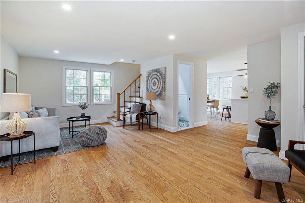 Wood floors and recessed lights throughout 'new' home